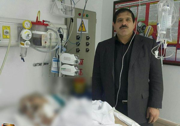 عکس عباس جدیدی با جسد منصور پورحیدری